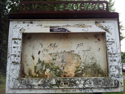 empty dirty old display board